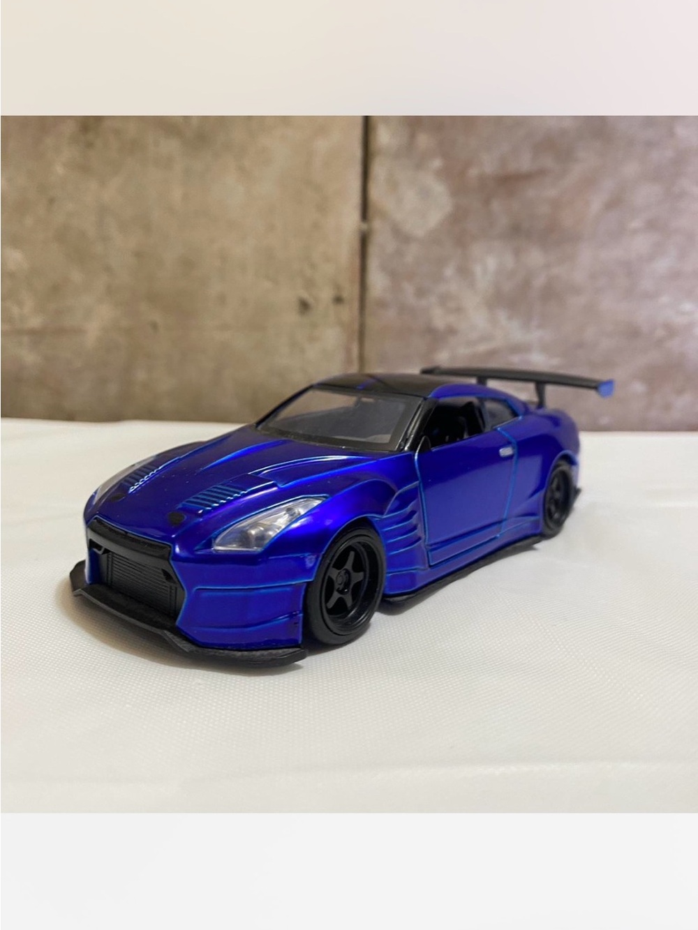 Metallic Blue Toy Nissan R35 Car with Rear Wing